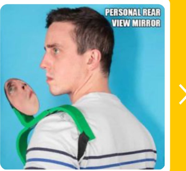 A personal rear view mirror worn on the shoulder
